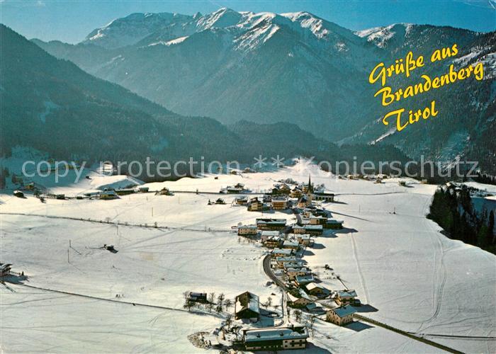 Brandenberg Tirol Gebirgsdorf Winterlandschaft mit Rofangebirge Fliegeraufnahme