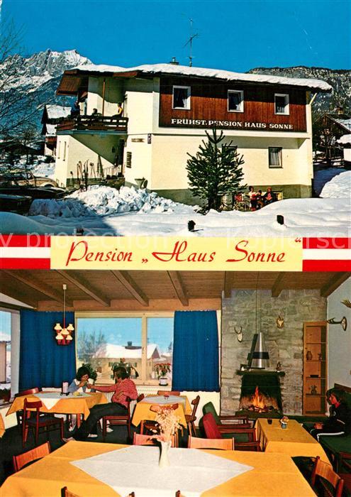 St Johann Tirol Pension Haus Sonne Gastraum Winterlandschaft Alpen