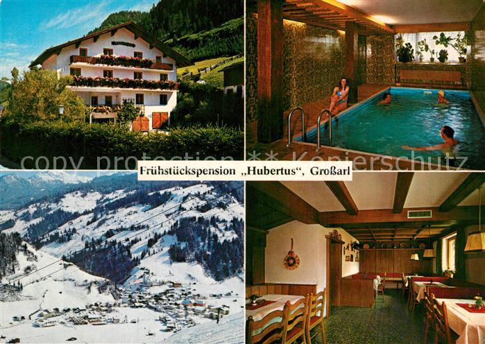 Grossarl Pension Hubertus Gastraum Hallenbad Winterlandschaft Alpen
