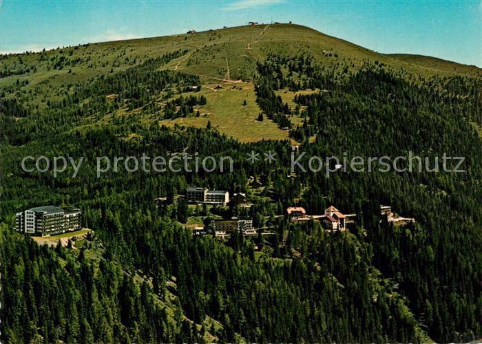 Kanzelhoehe Fliegeraufnahme mit Appartmenthaus Edelweiss und Gerlitzen