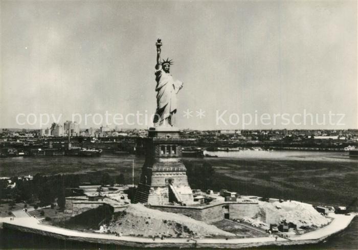 New York City Statue of Liberty in front of New York Harbour aerial view