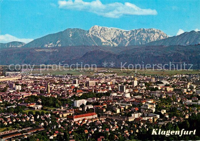 Klagenfurt Woerthersee Stadtpanorama mit Blick zum Hochobir Fliegeraufnahme