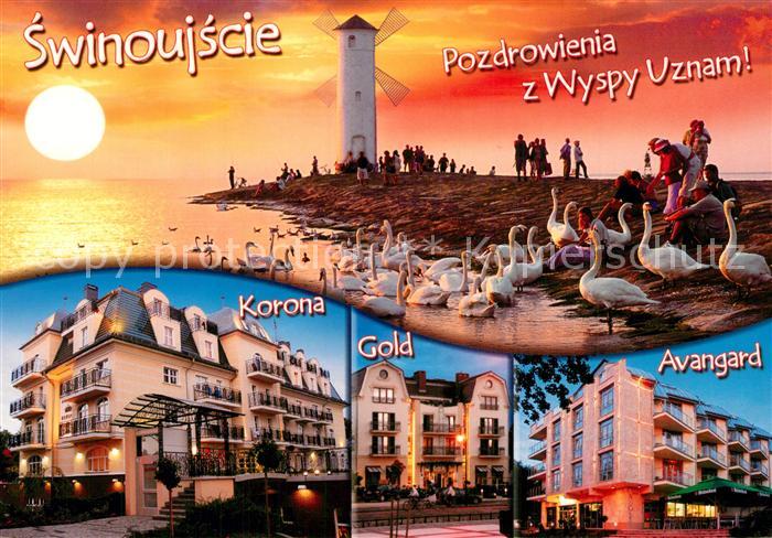 Swinoujscie Swinemuende Sonnenuntergang Windmuehle Schwaene Hotels
