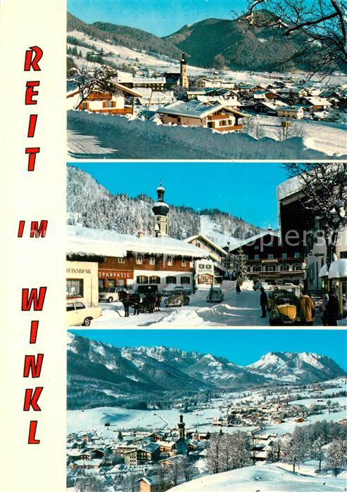 Reit Winkl Panorama mit Duernbachhorn Ortspartie mit Rathaus Kaisergebirge