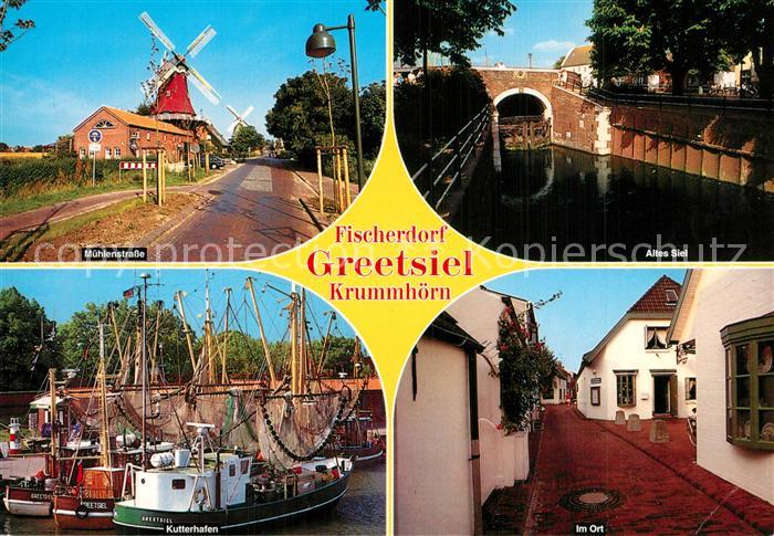 Greetsiel Ortsmotiv Fischerdorf Altes Siel Windmuehlen Hafen Fischkutter