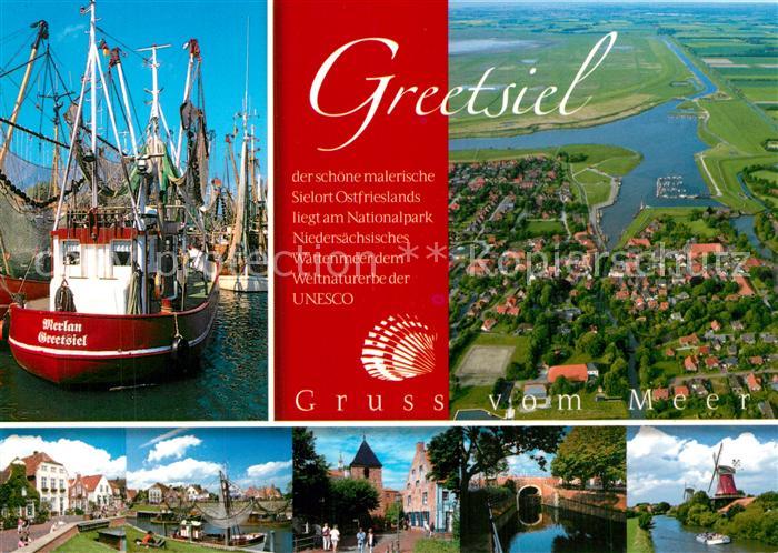 Greetsiel Erholungsort Nordseekueste Fliegeraufnahme Fischkutter Hafen Windmuehl