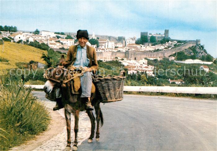 Obidos A caminho do mercado Esel Lasttier auf dem Weg zum Markt Stadtmauer