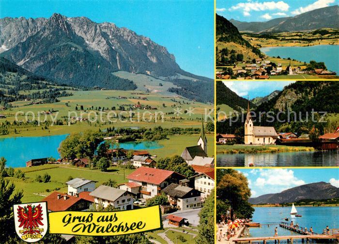 Walchsee Tirol Panorama mit Kaisergebirge Kirche Badestrand Steg