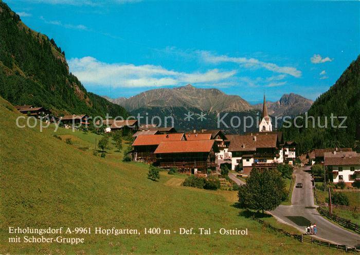 Hopfgarten Defereggen Ortsansicht mit Kirche Blick gegen Schobergruppe Hohe Taue