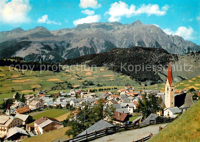 Nauders Tirol mit Kirche und Piz Mandin