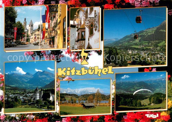Kitzbuehel Tirol Hauptstrasse Erker Seilbahn Kirche Gleitschirmflieger