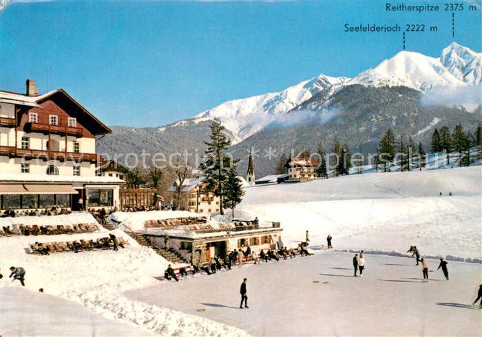 Seefeld Tirol Eislaufplatz mit Hotel Wetterstein Wintersportplatz Alpen