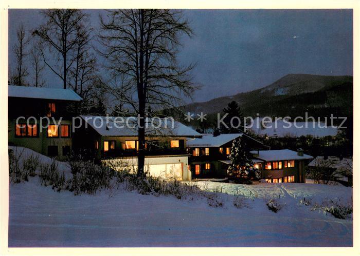 Ruhpolding Sporthotel Gaestehaus Am Westernberg im Winter Nachtaufnahme