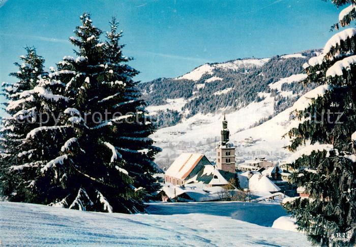 Megeve Le clocher et les Pentes du Christomet en hiver