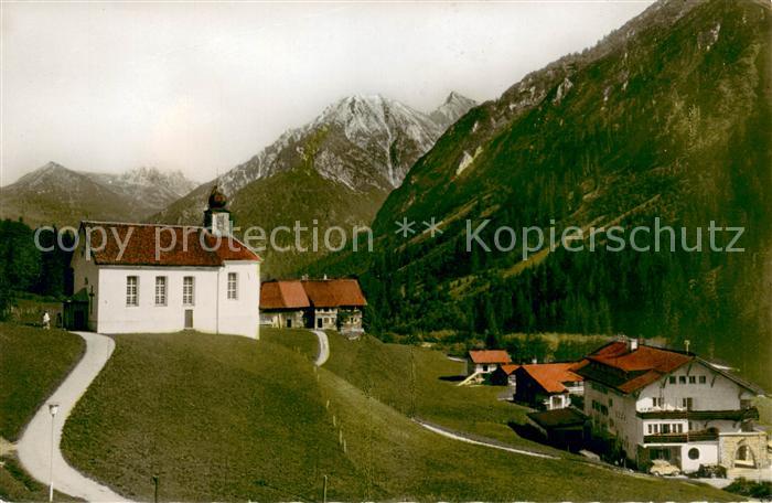 Baad Mittelberg Kleinwalsertal Ortsansicht mit Kirche Alpen