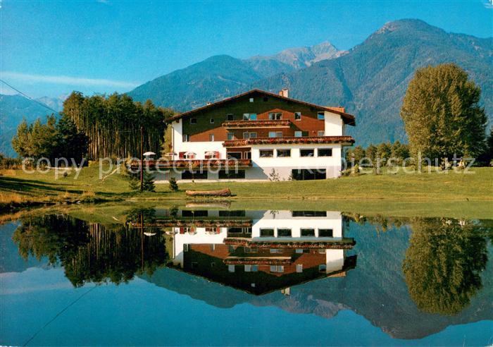 Natz Brixen Suedtirol Pension Cafe Seehof Ansicht vom See aus Wasserspiegelung A