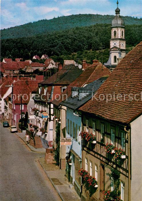 Moenchberg Spessart Hauptstrasse mit Kirche