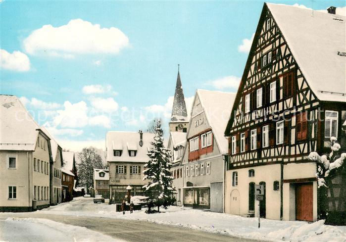 Lorch Rheingau Hauptstrasse mit evangelischer Kirche Fachwerkhaus im Winter