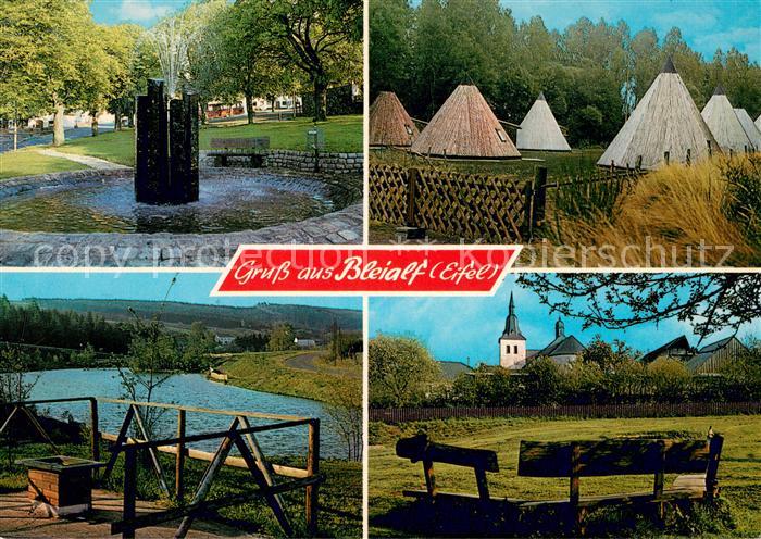 Bleialf Brunnen Partie am Wasser Blick zur Kirche