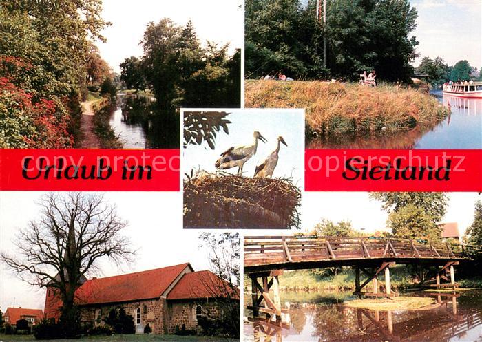 Ihlienworth Urlaub im Sietland Partie am Wasser Holzbruecke Stoerche