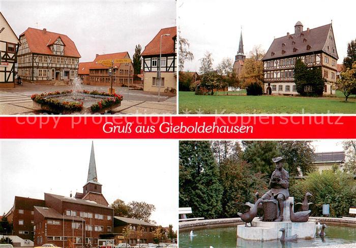 Gieboldehausen Marktplatz Brunnen Fachwerkhaeuser Kirche Brunnen