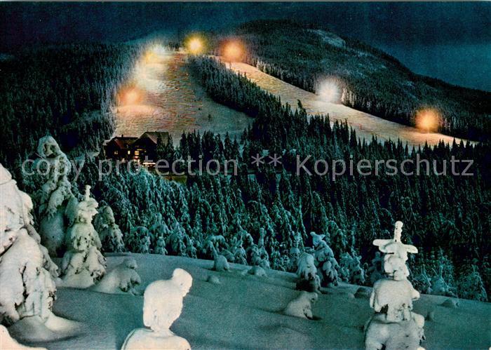 Unterstmatt Hoehenhotel Skipisten bei Flutlicht Wintersport Alpen