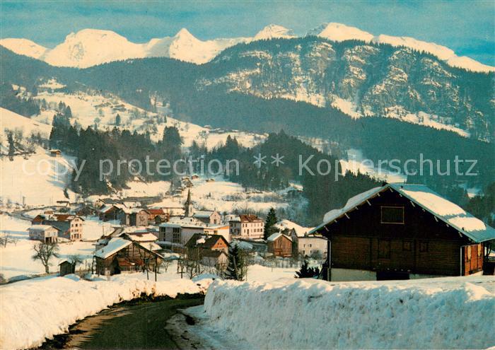 Saint-Jean-de-Sixt Vue Generale du village et les Alpes en hiver