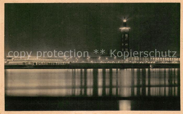 Koeln Rhein Rheinfront der Pressa in Beleuchtung