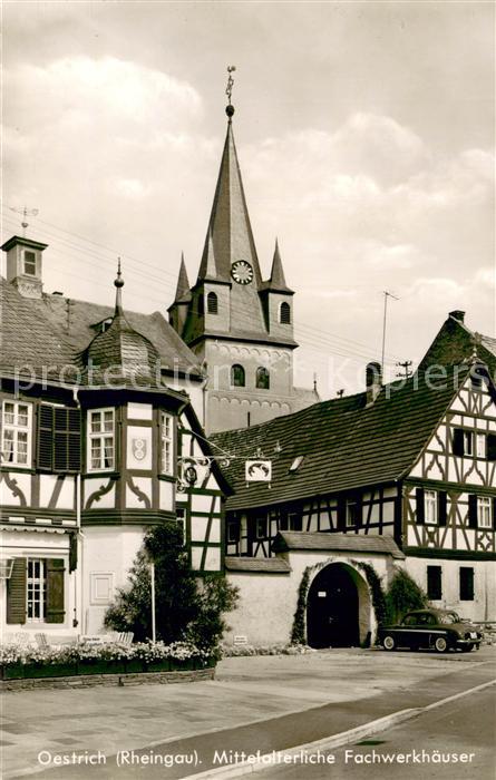 Oestrich-Winkel Mittelalterliche Fachwerkhaeuser Kirchturm