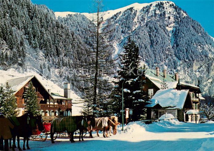 Badgastein Hoteldorf Gruener Baum im Koetschachtal Pferdeschlitten Alpen