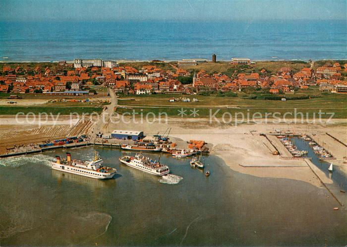 Juist Nordseebad Hafen mit Faehren Frisia II und Frisia VI Fliegeraufnahme