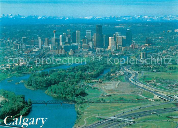 Calgary The city skyline with the Rockies on the horizon