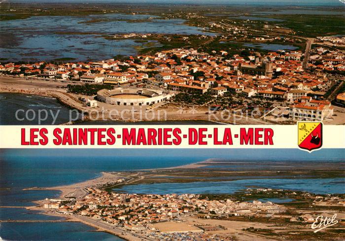 Les Saintes-Maries-de-la-Mer Les arènes Eglise et au fond les marais vue aérienn