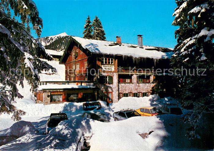 Spitzingsee Berggasthof Alte Wurzhuette im Winter Schnee