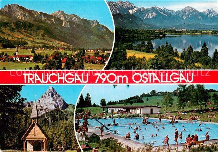 Trauchgau Gesamtansicht mit Alpenpanorama See Freibad Kapelle