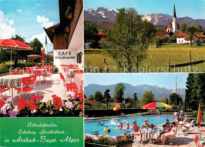 Arzbach Bad Toelz Cafe Schusterpeter Terrasse Freibad Blick zur Kirche Alpen