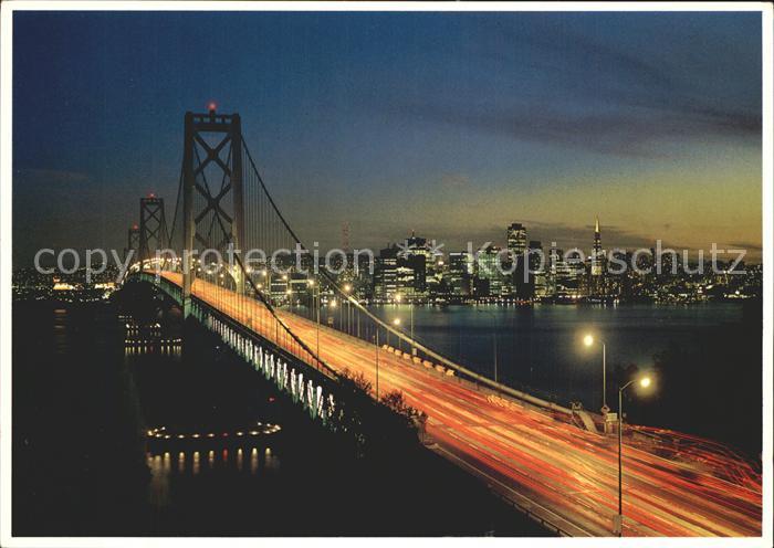 San Francisco California Skyline and Oakland Bay Bridge at dusk
