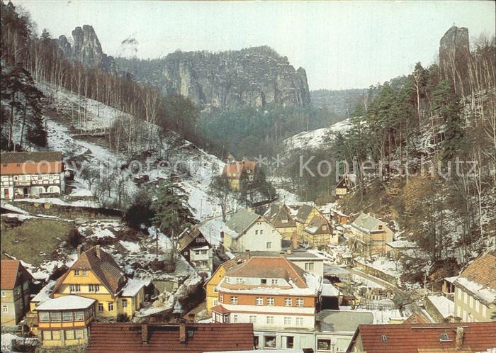 Rathen Saechsische Schweiz Teilansicht im Winter Felsen Elbsandsteingebirge