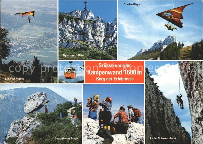 Aschau Chiemgau Kampenwand Gipfelkreuz Drachenflieger Bergsteiger Schneeschlucht