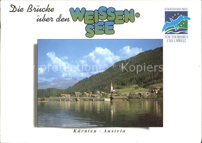 Weissensee Kaernten alte Holzbruecke