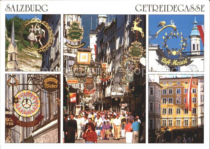 Salzburg Oesterreich Getreidegasse Geschaeftsschildern Cafe Mozart Schlosserei W