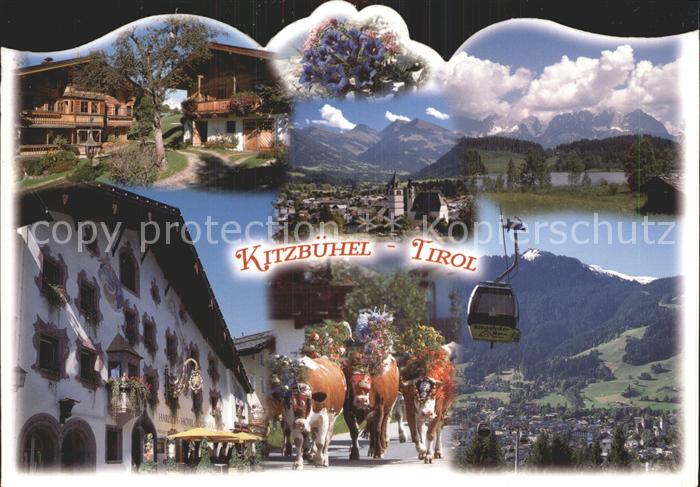Kitzbuehel Tirol Teilansichten Fassadenmalerei Almabtrieb Kuehe Bergbahn Alpenpa