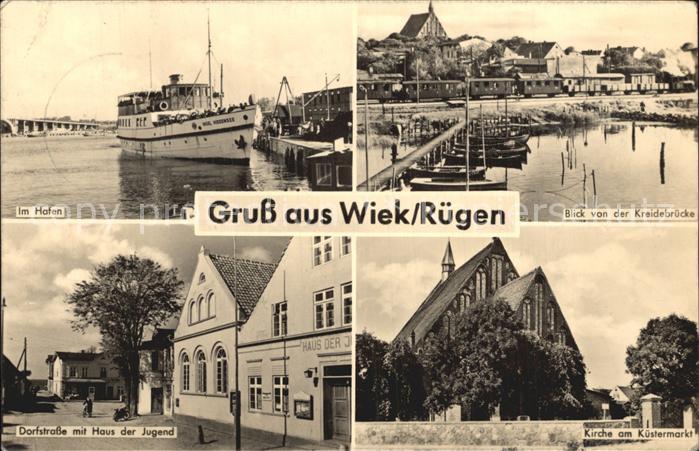 Wiek Ruegen Hafen Kreidebruecke Dorfstrasse mit Haus der Jugend Kirche Kuesterma