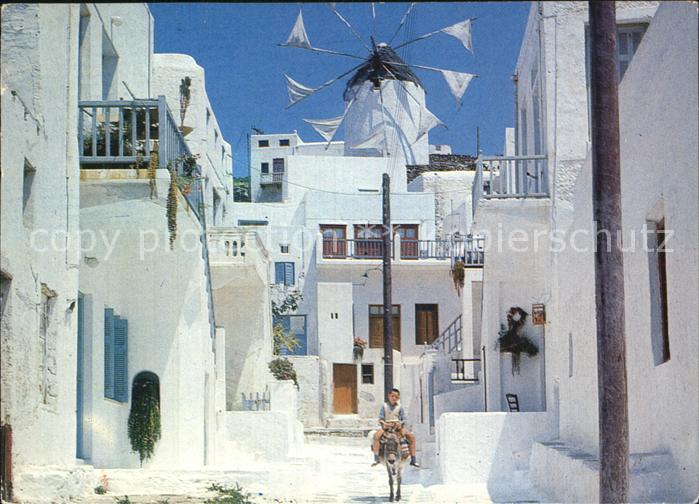 Mykonos Kykladeninsel aegaeis Malerische Strasse mit Kind und Esel