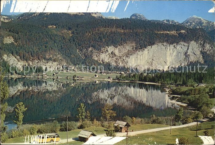 Goessl Grundlsee mit Grasberg Wasserspiegelung Steirisch