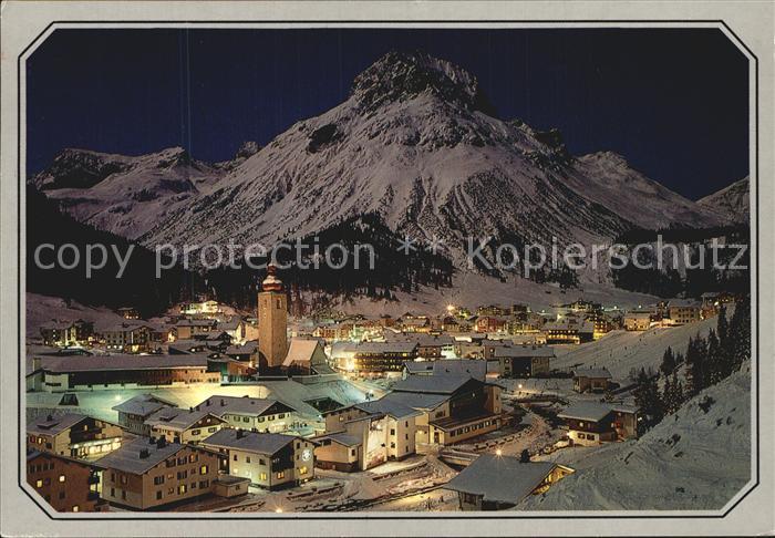 Lech Vorarlberg Ortsansicht mit Kirche Nachtaufnahme Omeshorn Lechtaler Alpen