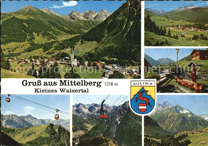 Mittelberg Kleinwalsertal Gesamtansicht mit Alpenpanorama Holzbrunnen Bergbahn