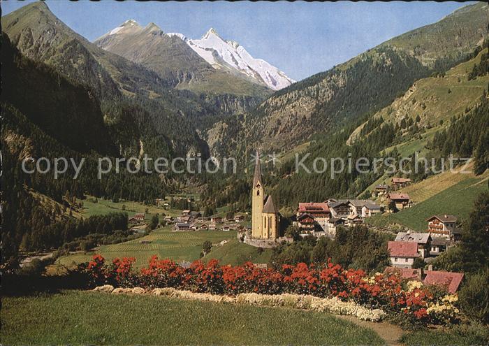Heiligenblut Kaernten Ortsansicht mit Kirche Grossglockner Hochalpenstrasse Hoeh