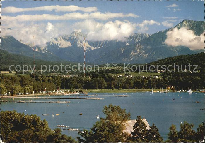Klagenfurt Woerthersee See mit Strandbad und Koschuta