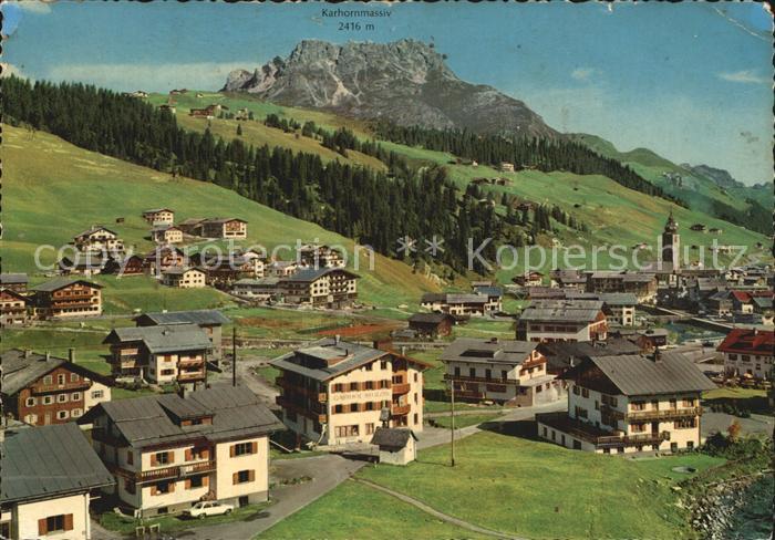 Lech Vorarlberg Ortsansicht mit Kirche mit Blick zum Karhornmassiv Lechquellenge